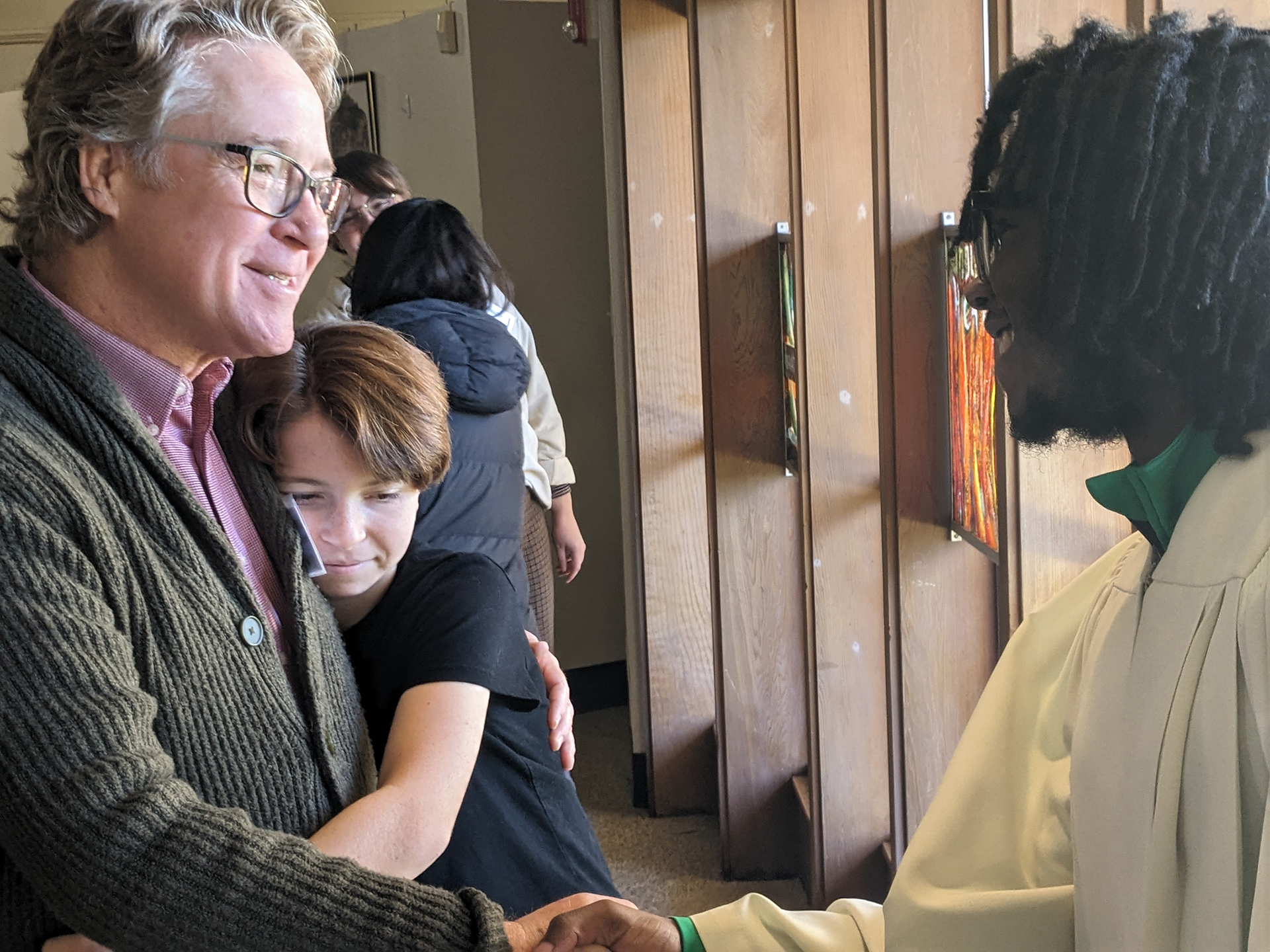 Pictured is a member of Trinity Presbyterian Church greeting a member of the choir of Trinity Presbyterian Church.